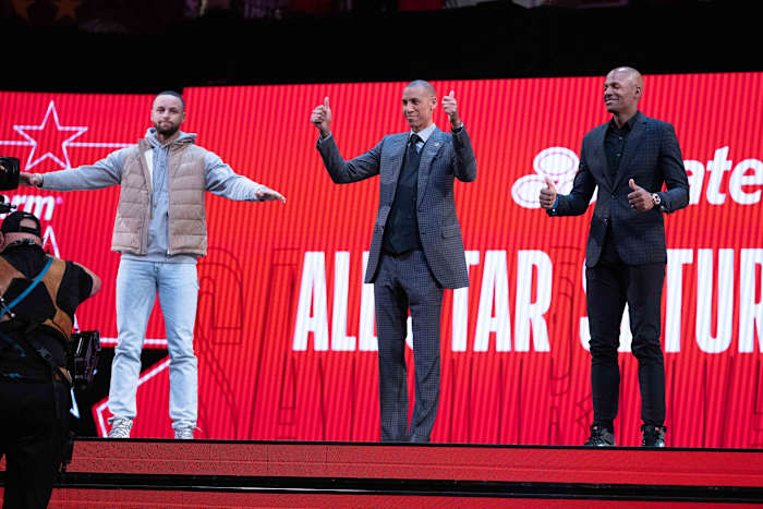 Golden State Warriors guard Stephen Curry (30, left) and NBA great Reggie Miller (center) and NBA great Ray Allen (right)
